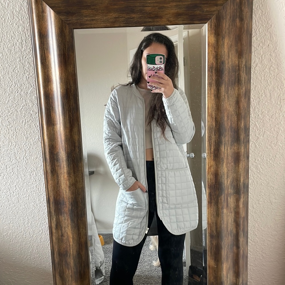 Light grey quilted long winter jacket